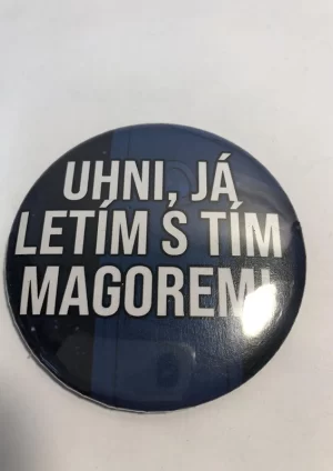 Uhni, já letím s tím magorem! – placka